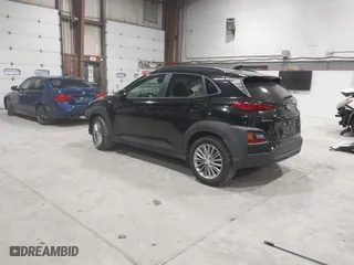 2019 Hyundai Kona SEL with VIN KM8K6CAA4KU382976, listed as a IAAI auction lot 41820749 with 61,619 mi miles. Bid and sale history available at carsss.com. Image 3.