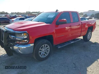 2018 Chevrolet Silverado 1500 LT with VIN 1GCRCREC1JZ170659, listed as a IAAI auction lot 41522588 with 129,412 mi miles and . Bid and sale history available at DreamBid. Image 18.