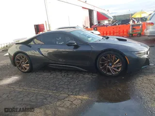 2016 BMW i8 with VIN WBY2Z2C50GV674856, listed as a IAAI auction lot 40862121 with 51,700 mi miles. Bid and sale history available at carsss.com. Image 14.