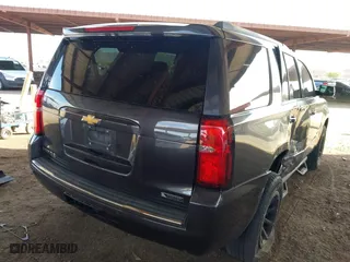 2018 Chevrolet Tahoe Premier with VIN 1GNSCCKC6JR112086, listed as a IAAI auction lot 41939413 with 93,946 mi miles. Bid and sale history available at carsss.com. Image 4.