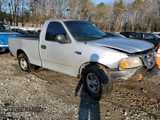 2002 Ford F-150 XL with VIN 1FTRF17202NB11513, listed as a Copart auction lot 85773084 with 120,443 mi miles and Salvage Title. Bid and sale history available at carsss.com. Image 4.