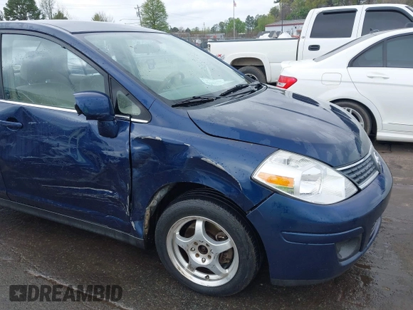 2007 Nissan Versa 1.8 SL with VIN 3N1BC11E67L420474, listed as a IAAI auction lot 41887735 with 199,094 mi miles. Bid and sale history available at carsss.com. Image 6.