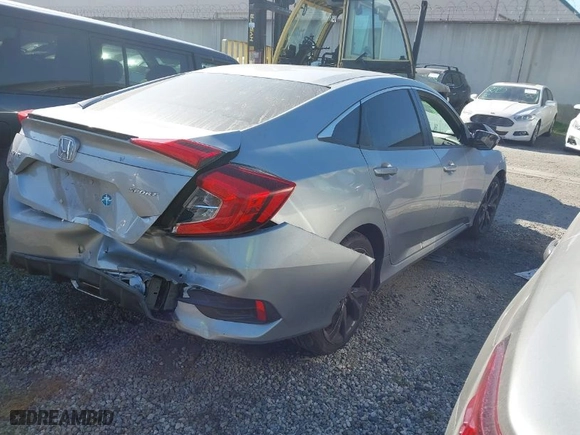 2019 Honda Civic Sedan Sport with VIN 19XFC2F84KE200822, listed as a IAAI auction lot 41753976 with 77,090 mi miles. Bid and sale history available at carsss.com. Image 4.