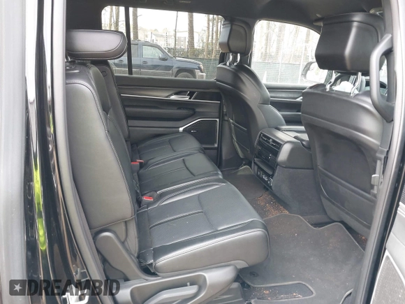 2024 Jeep Wagoneer Series II with VIN 1C4SJUBP7RS126607, listed as a IAAI auction lot 41942412 with 28,769 mi miles and . Bid and sale history available at DreamBid. Image 8.