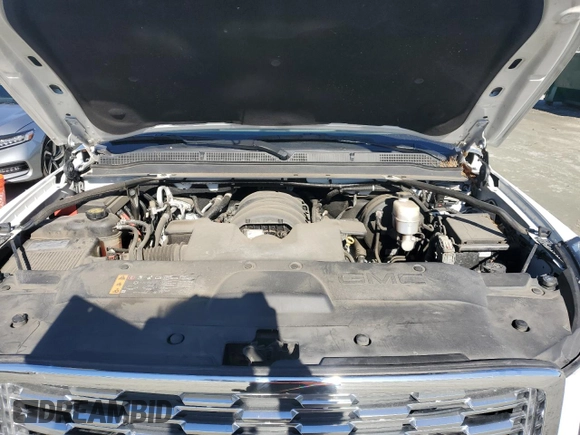 2019 GMC Yukon XL Denali with VIN 1GKS2HKJ2KR103446, listed as a Copart auction lot 88519755 with 77,779 mi miles and Salvage Title. Bid and sale history available at DreamBid. Image 12.