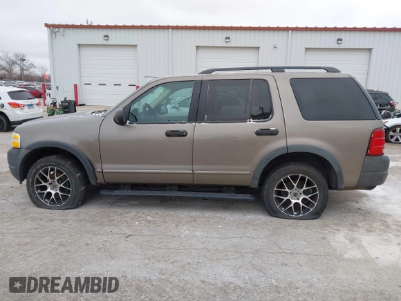 2003 Ford Explorer XLS z VIN 1FMZU72K03UA75695, wystawiony jako IAAI lot #41250087 z przebiegiem 134 795 mil mil oraz . Historia ofert i sprzedaży dostępna na DreamBid. Obrazek 14.