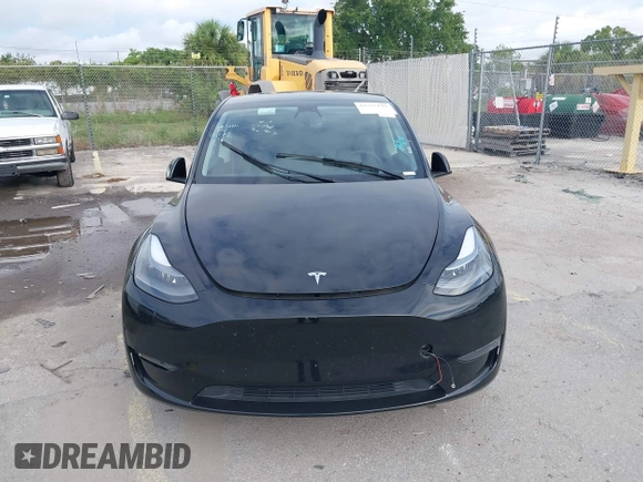 2023 Tesla Model Y Long Range with VIN 7SAYGDEE2PA044328, listed as a IAAI auction lot 42427625 with 41,324 mi miles and . Bid and sale history available at DreamBid. Image 12.