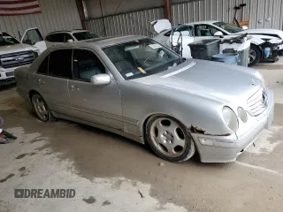 2000 Mercedes-Benz E-Class with VIN WDBJF70J7YB142395, listed as a Copart auction lot 53849225 with 138,289 mi miles and Clean Title. Bid and sale history available at carsss.com. Image 4.