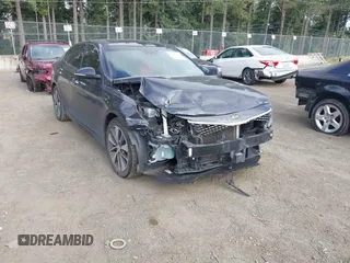2016 Kia Optima SX Turbo with VIN 5XXGW4L28GG010897, listed as a IAAI auction lot 42703779 with 121,918 mi miles and . Bid and sale history available at DreamBid. Image 1.