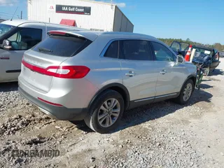 2017 Lincoln MKX Premiere with VIN 2LMPJ6JR3HBL14683, listed as a IAAI auction lot 41143809 with 90,590 mi miles. Bid and sale history available at carsss.com. Image 4.