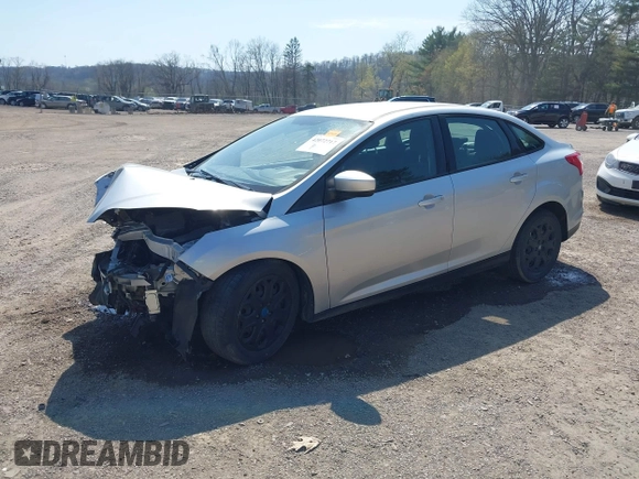 2012 Ford Focus SE with VIN 1FAHP3F2XCL217086, listed as a IAAI auction lot 42072717 with 112,549 mi miles. Bid and sale history available at carsss.com. Image 2.