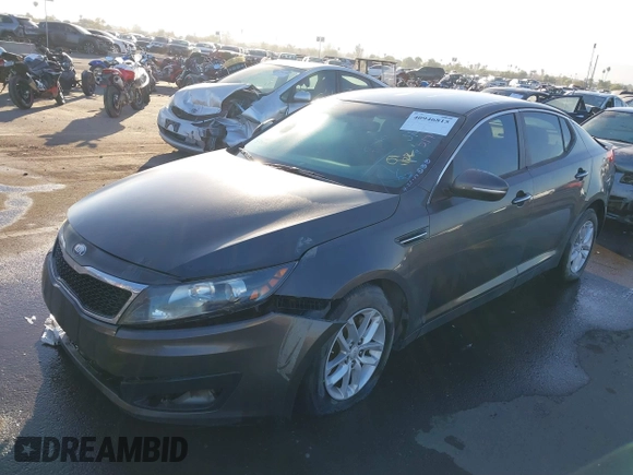 2013 Kia Optima LX with VIN 5XXGM4A71DG156414, listed as a IAAI auction lot 40946815 with 60,278 mi miles. Bid and sale history available at carsss.com. Image 2.