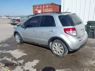 2010 Suzuki SX4 with VIN JS2YA5A30A6301412, listed as a IAAI auction lot 40599958 with 123,177 mi miles. Bid and sale history available at carsss.com. Image 3.