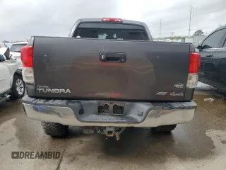 2013 Toyota Tundra с VIN 5TFDW5F13DX297551, выставлен на аукционе Copart как лот 51638505 с пробегом 116 812 миль миль и Списание • Salvage title. История ставок и продаж доступна на DreamBid. Изображение 6.