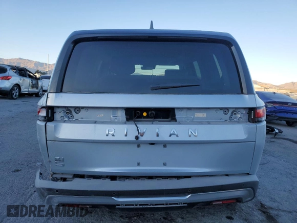 2025 Rivian R1S Adventure with VIN 7PDSGBBA0SN051096, listed as a Copart auction lot 87441054 with 30 mi miles and Salvage Title. Bid and sale history available at carsss.com. Image 6.