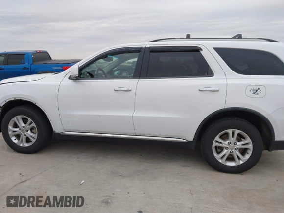 2013 Dodge Durango Crew with VIN 1C4RDHDG5DC617061, listed as a IAAI auction lot 41385801 with 142,304 mi miles. Bid and sale history available at carsss.com. Image 15.