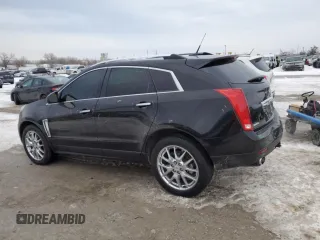 2014 Cadillac SRX Performance Collection with VIN 3GYFNCE39ES587759, listed as a Copart auction lot 87953485 with 109,327 mi miles and Salvage Title. Bid and sale history available at carsss.com. Image 2.