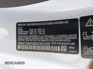 2022 BMW 4 Series 430i xDrive with VIN WBA73AP03NCH61029, listed as a IAAI auction lot 42327779 with 104,860 mi miles and . Bid and sale history available at DreamBid. Image 9.