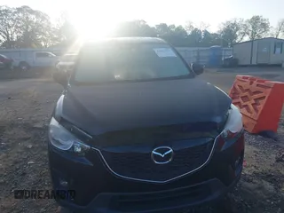 2015 Mazda CX-5 Grand Touring with VIN JM3KE4DY6F0513173, listed as a IAAI auction lot 41867030 with 93,770 mi miles. Bid and sale history available at carsss.com. Image 12.