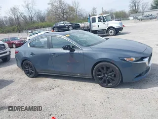 2024 Mazda 3 S Carbon Edition with VIN 3MZBPBCM3RM416565, listed as a IAAI auction lot 42047841 with 11,074 mi miles and . Bid and sale history available at DreamBid. Image 13.