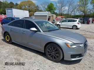 2016 Audi A6 Premium z VIN WAUCFAFC2GN111968, wystawiony jako IAAI lot #42003738 z przebiegiem 149 089 mil mil oraz . Historia ofert i sprzedaży dostępna na DreamBid. Obrazek 1.