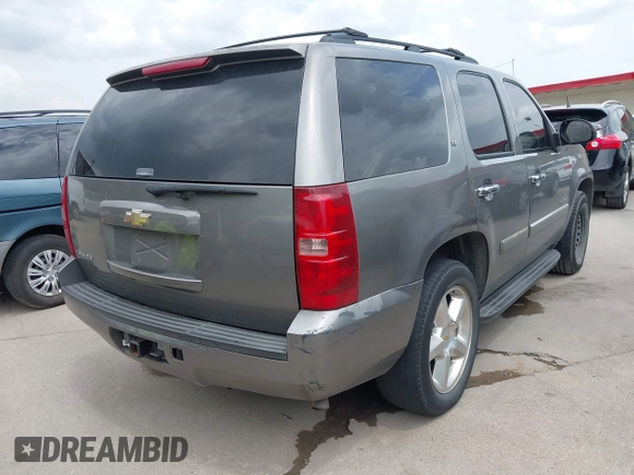 2007 Chevrolet Tahoe LTZ with VIN 1GNFC13J37J399493, listed as a IAAI auction lot 42656195 with 231,950 mi miles and . Bid and sale history available at DreamBid. Image 4.