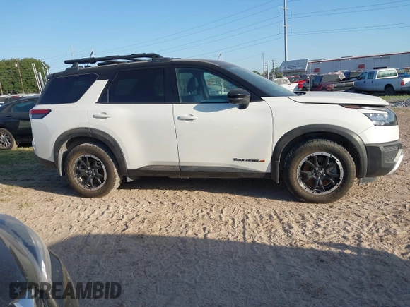 2023 Nissan Pathfinder Rock Creek with VIN 5N1DR3BD6PC254342, listed as a IAAI auction lot 41950069 with 26,144 mi miles and . Bid and sale history available at DreamBid. Image 13.