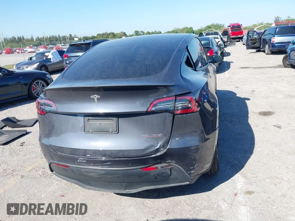 2022 Tesla Model Y Performance with VIN 7SAYGDEF6NF540094, listed as a IAAI auction lot 41786865 with 28,356 mi miles and . Bid and sale history available at DreamBid. Image 16.