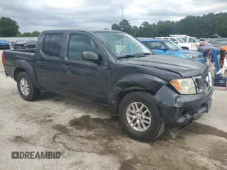 2014 Nissan Frontier SV with VIN 1N6AD0ER0EN752689, listed as a Copart auction lot 61482715 with 159,953 mi miles and Salvage title. Bid and sale history available at DreamBid. Image 4.