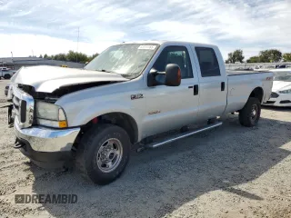 2004 Ford F-350 XL with VIN 1FTSW31P04EC44129, listed as a Copart auction lot 63519165 with 205,411 mi miles and Salvage title. Bid and sale history available at DreamBid. Image 1.