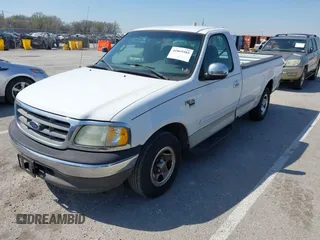 2002 Ford F-150 XL with VIN 1FTRF17W72NA67786, listed as a IAAI auction lot 41869585 with 180,262 mi miles. Bid and sale history available at carsss.com. Image 2.