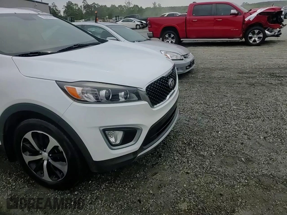 2016 Kia Sorento EX with VIN 5XYPH4A52GG125241, listed as a Copart auction lot 55995805 with 128,788 mi miles and Salvage title. Bid and sale history available at DreamBid. Image 14.