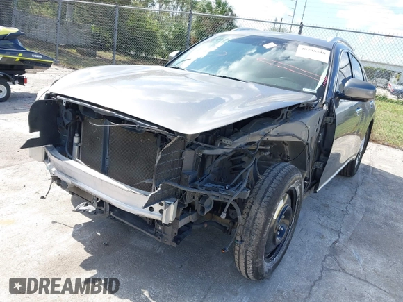 2013 Infiniti FX with VIN JN8CS1MU0DM140711, listed as a IAAI auction lot 40796518 with 179,386 mi miles and . Bid and sale history available at DreamBid. Image 6.