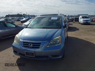 2008 Honda Odyssey Touring with VIN 5FNRL38868B047556, listed as a IAAI auction lot 41581617 with 220,436 mi miles. Bid and sale history available at carsss.com. Image 6.