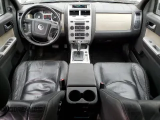 2009 Mercury Mariner Premier with VIN 4M2CU97G39KJ24297, listed as a Copart auction lot 77472674 with 153,316 mi miles and Salvage Title. Bid and sale history available at carsss.com. Image 8.