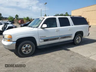 2003 GMC Yukon XL SLT z VIN 3GKEC16Z63G240635, wystawiony jako Copart lot #54968215 z przebiegiem 381 025 mil mil oraz Czysty tytuł • Clean title. Historia ofert i sprzedaży dostępna na DreamBid. Obrazek 1.