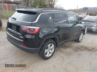 2019 Jeep Compass Latitude with VIN 3C4NJDBB1KT754314, listed as a IAAI auction lot 41869595 with 65,162 mi miles. Bid and sale history available at carsss.com. Image 4.