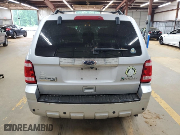 2010 Ford Escape Hybrid with VIN 1FMCU4K31AKC24086, listed as a Copart auction lot 54580895 with 194,510 mi miles and Salvage title. Bid and sale history available at DreamBid. Image 6.