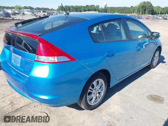 2010 Honda Insight EX with VIN JHMZE2H74AS013148, listed as a IAAI auction lot 42194894 with 114,885 mi miles and . Bid and sale history available at DreamBid. Image 4.