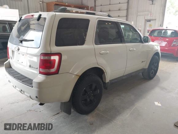 2009 Ford Escape Hybrid z VIN 1FMCU59329KB01081, wystawiony jako IAAI lot #42557114 z przebiegiem 206 972 mil mil oraz . Historia ofert i sprzedaży dostępna na DreamBid. Obrazek 4.