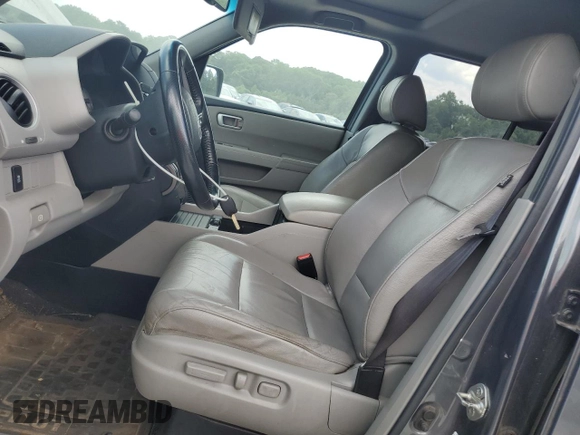 2012 Honda Pilot EX-L with VIN 5FNYF4H54CB020718, listed as a Copart auction lot 56479085 with 188,355 mi miles and Salvage title. Bid and sale history available at DreamBid. Image 7.