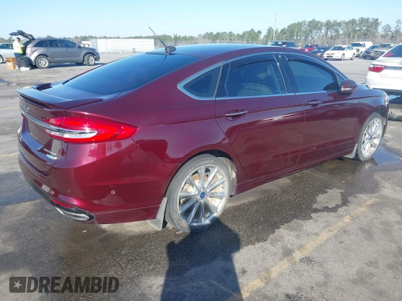 2017 Ford Fusion Titanium with VIN 3FA6P0K96HR137401, listed as a IAAI auction lot 41762567 with 95,958 mi miles. Bid and sale history available at carsss.com. Image 4.