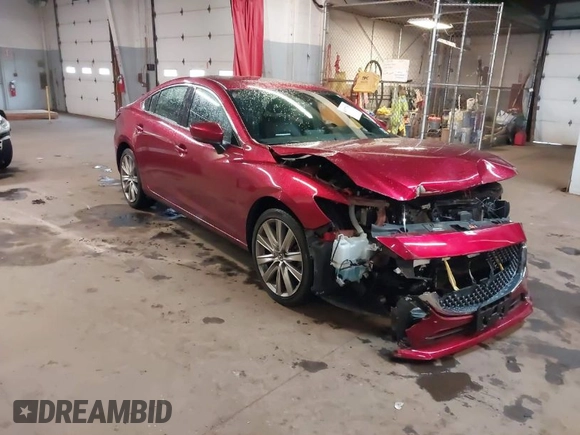 2020 Mazda 6 Signature with VIN JM1GL1XY6L1526896, listed as a IAAI auction lot 41977208 with 18,624 mi miles and . Bid and sale history available at DreamBid. Image 1.