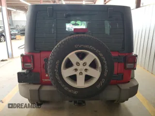 2012 Jeep Wrangler Unlimited Sport z VIN 1C4BJWDG2CL171531, wystawiony jako Copart lot #62181805 z przebiegiem 195 394 mil mil oraz Szkoda całkowita • Salvage title. Historia ofert i sprzedaży dostępna na DreamBid. Obrazek 6.