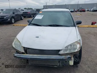 2005 Honda Civic Cpe LX with VIN 1HGEM22595L051891, listed as a IAAI auction lot 41271309 with 146,060 mi miles. Bid and sale history available at carsss.com. Image 12.
