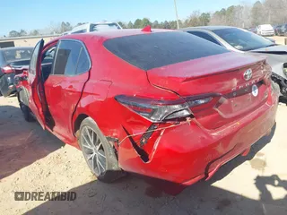 2023 Toyota Camry SE with VIN 4T1G11AK9PU157316, listed as a IAAI auction lot 41595697 with 60,233 mi miles and . Bid and sale history available at DreamBid. Image 3.