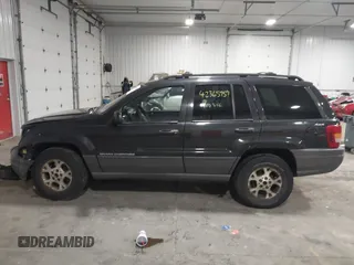 1999 Jeep Grand Cherokee Laredo with VIN 1J4GW58SXXC649579, listed as a IAAI auction lot 42365959 with 199,742 mi miles and . Bid and sale history available at DreamBid. Image 14.