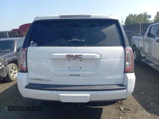 2019 GMC Yukon XL SLT with VIN 1GKS2GKC1KR279755, listed as a Copart auction lot 64695394 with 0 mi miles and Salvage Title. Bid and sale history available at carsss.com. Image 6.