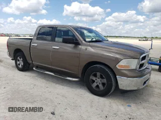 2009 Dodge 1500 SLT with VIN 1D3HB13P89S750668, listed as a Copart auction lot 56528835 with 124,059 mi miles and Clean Title. Bid and sale history available at DreamBid. Image 4.