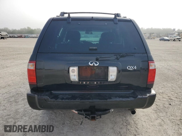 2001 Infiniti QX4 with VIN JNRDR09X21W204207, listed as a Copart auction lot 79935604 with Not Provided miles and Salvage Title. Bid and sale history available at DreamBid. Image 6.